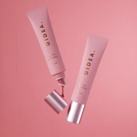 lip tint tube with applicator, pink cosmetic packaging by Gidea Pac