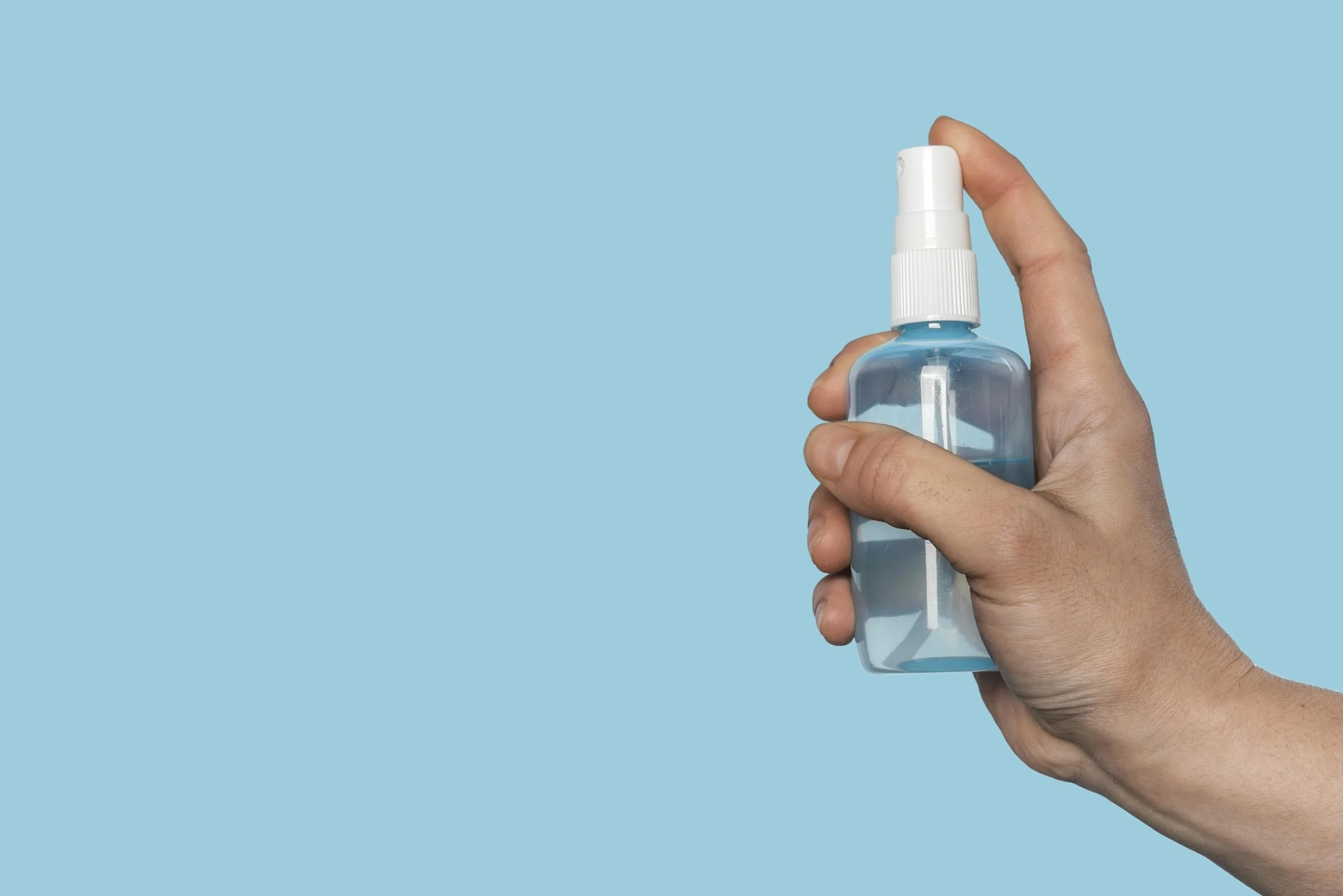 woman-holding-spray-bottle